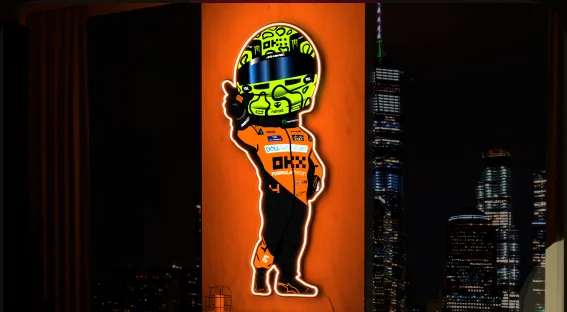 A driver cartoon as a neon wall light